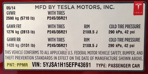 TESLA paint code label on the vehicle – find your exact color match.